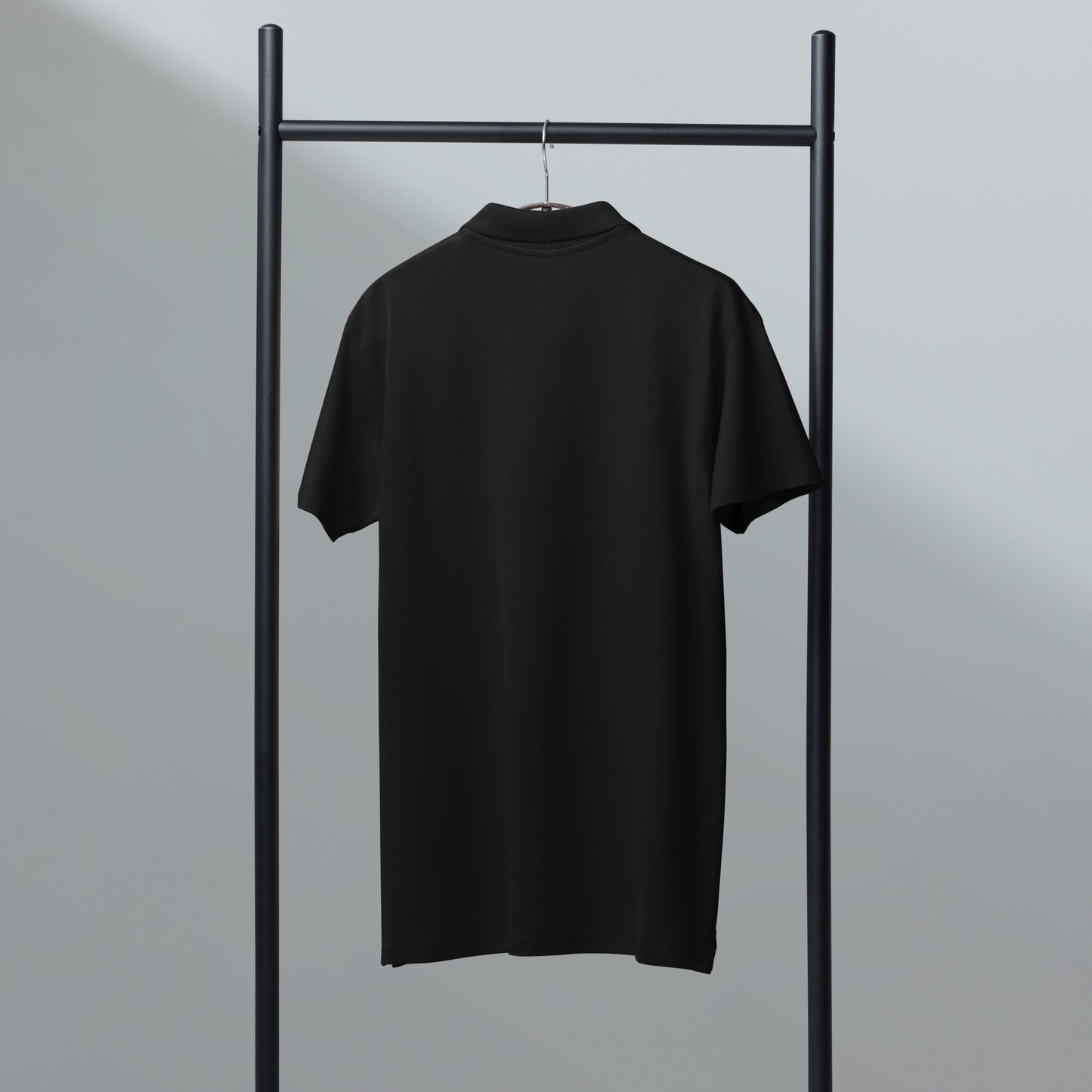 Unisex premium Polo Shirt schwarz Rückseite