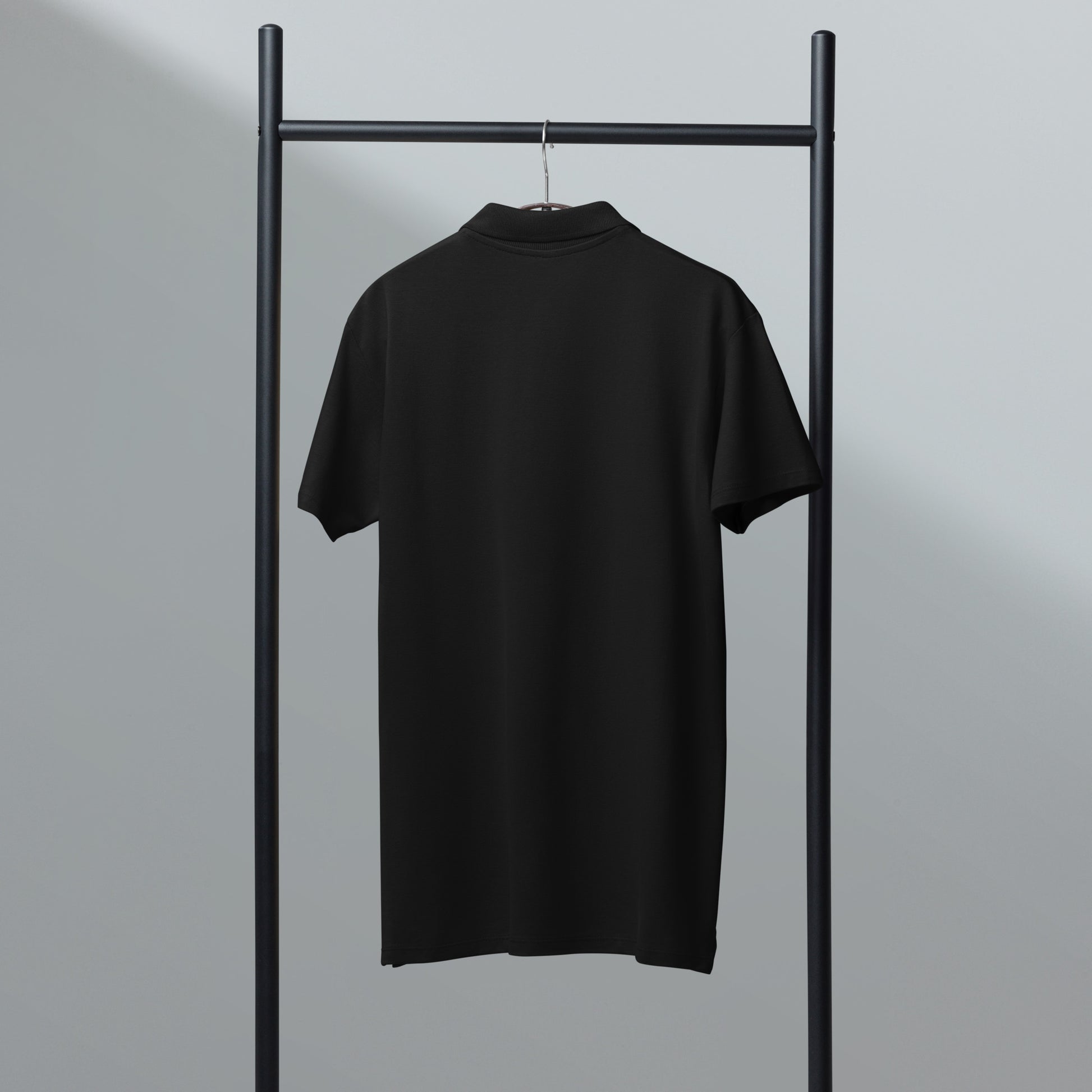 Unisex premium Polo Shirt schwarz Rückseite